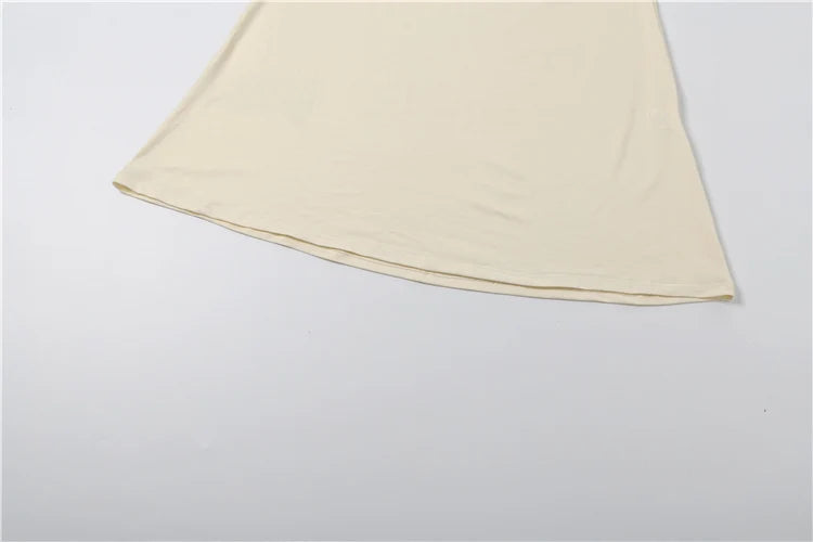 Nibber Elegant 2-Piece Set – Irregular Sleeve Crop Top &amp; Elastic Waist Long Skirt